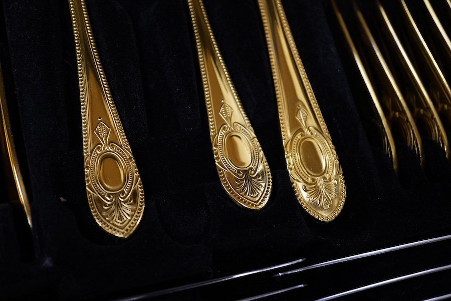 A Bestecke Solingen gold plated canteen of cutlery. Condition - good, one piece missing
